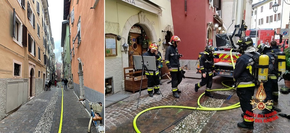 Incendio in centro a Riva del Garda: i vigili del fuoco salvano una donna che stava per saltare dal terzo piano